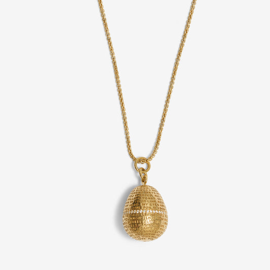 Gold necklace with a textured pendant on a white background